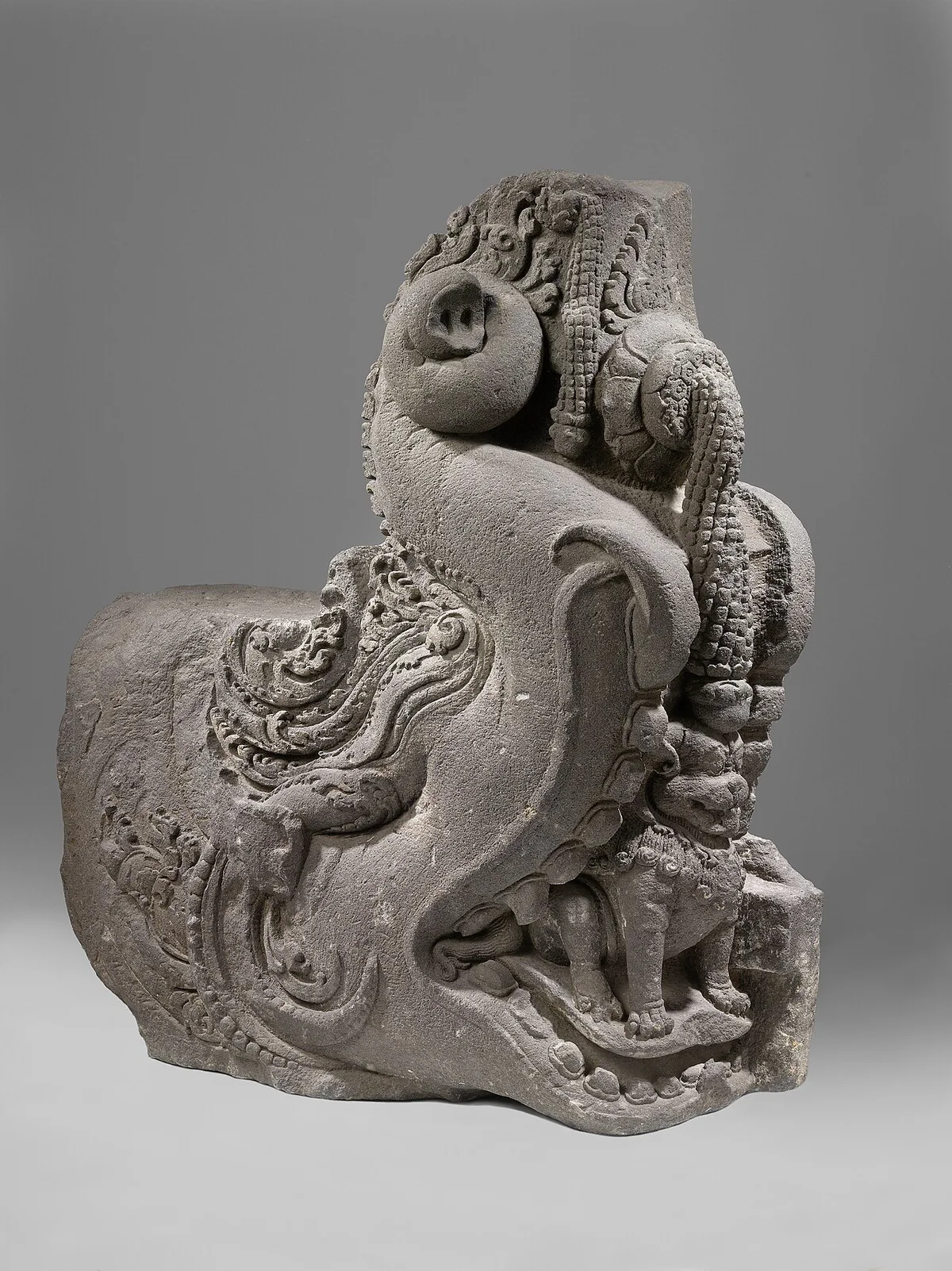 Carved stone makara architectural sculpture from Candi Sewu.